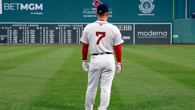 Boston Red Sox's Masataka Yoshida stands on the field during...