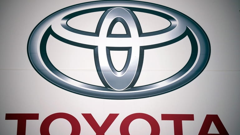 The Toyota Motor Corp. logo is seen, May 11, 2022,...