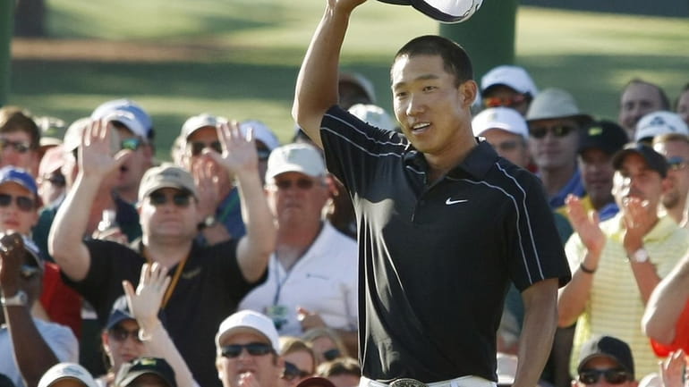 Anthony Kim saves his par on the 18th green to...