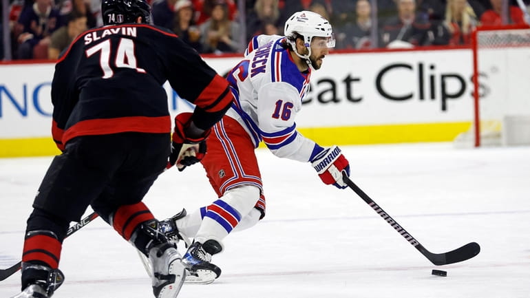 Rangers' Vincent Trocheck (16) controls the puck in front of...