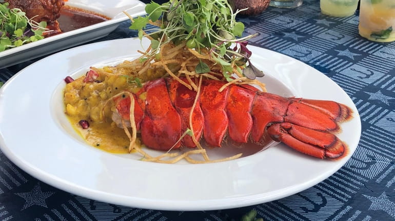 Lobster Malabar, featuring crab meat, coconut milk and curry, at...