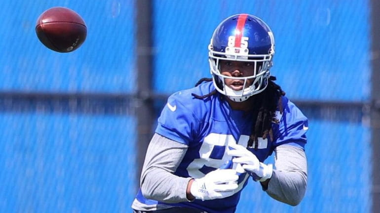 Kelvin Benjamin of the Giants runs drills during minicamp at Quest...