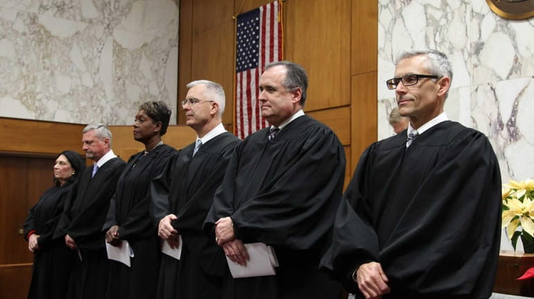 (L-R) Supreme Court Judges Anna Anzalone, Angelo Delligatti, Sharon Gianelli,...