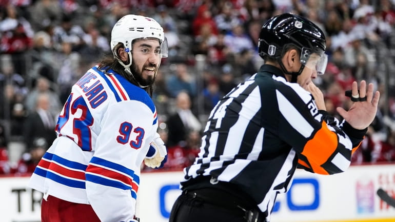 New York Rangers' Mika Zibanejad (93) argues a call during...