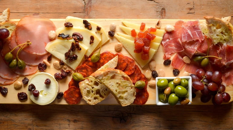 A Spanish meat and cheese board, or charcuterie, at Salumi...