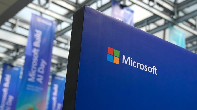 A logo of Microsoft is displayed during an event titled...