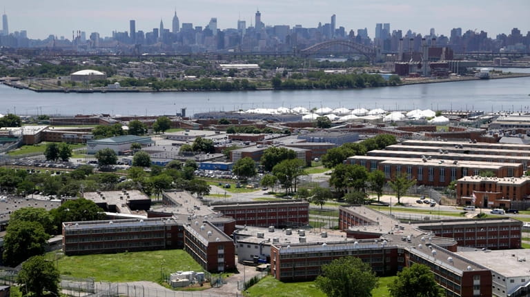 The Rikers Island jail complex stands in New York with...