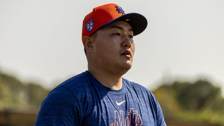 Mets infielder Ji-Man Choi looks on during a spring training...