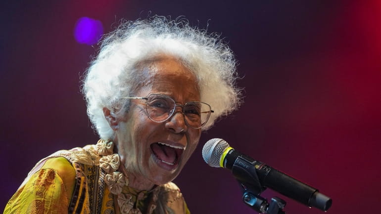 Brazilian singer Catia de Franca, 77, performs at a warehouse...