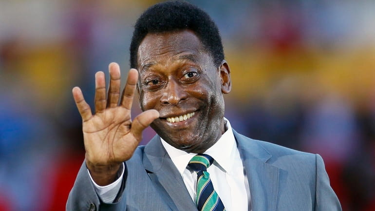 Brazilian soccer legend Pele waves prior to the African Cup...
