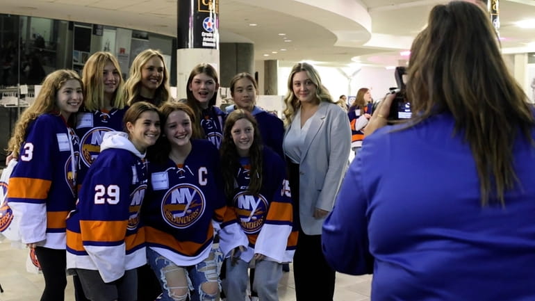 Islanders Girls Elite Hockey team celebrates 50th Anniversary of