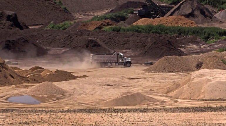 Sand is a necessary construction ingredient, but environmentalists say its...