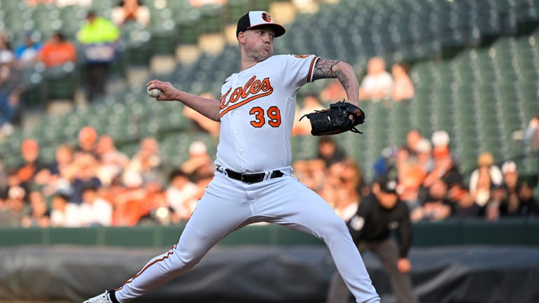 Baltimore Orioles starting pitcher Kyle Bradish (39) throws during the...