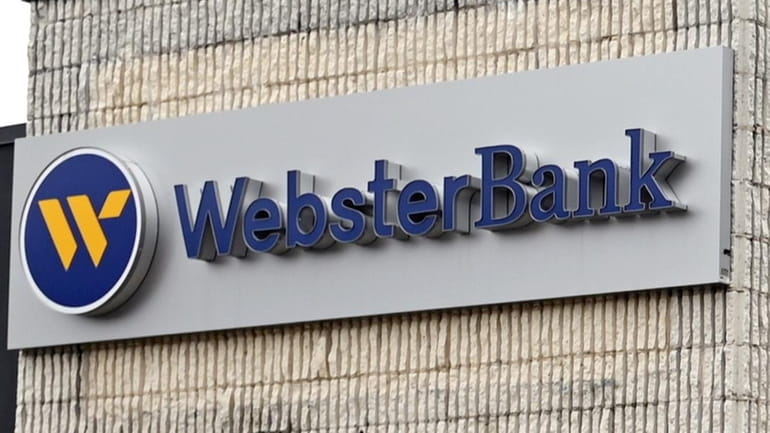 An employee of a Webster Bank in Jericho faces a...
