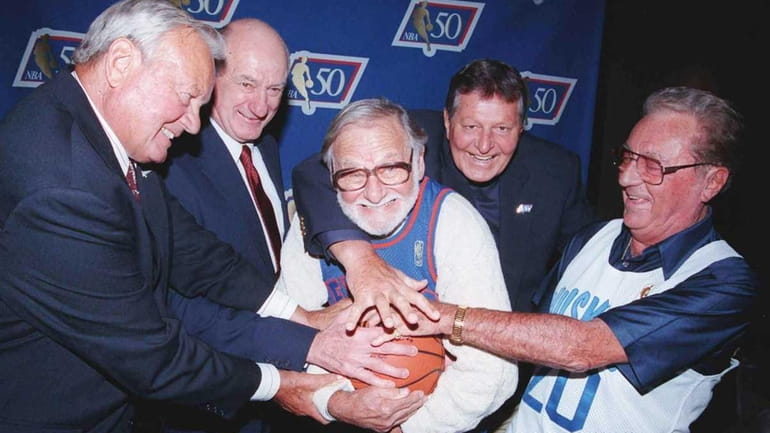 Former Toronto Huskies players, from left, Dick Schulz, Gino Sovran,...