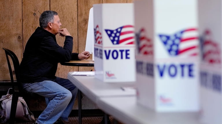 A man votes Tuesday, April 2, 2024, at Yellow Rock...