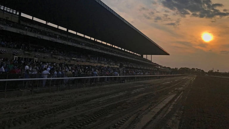 The sun sets on Belmont Park after the 155th running...