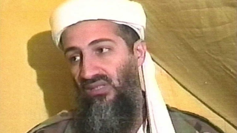 Al-Qaida Osama bin Laden in a Dec. 24, 1998 file...