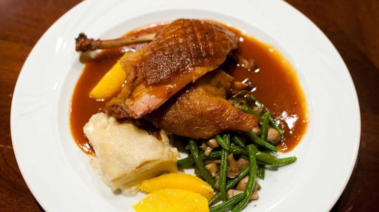 The classic French dish duck a l'orange is served at...