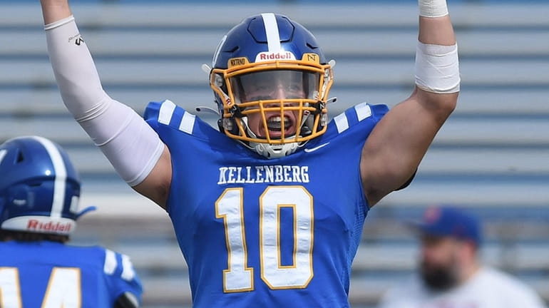 Kenny Noe, Kellenberg quarterback, reacts after throwing for a touchdown...