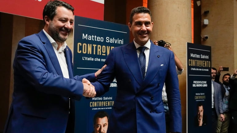 The League leader Matteo Salvini, left, arrives to his book...