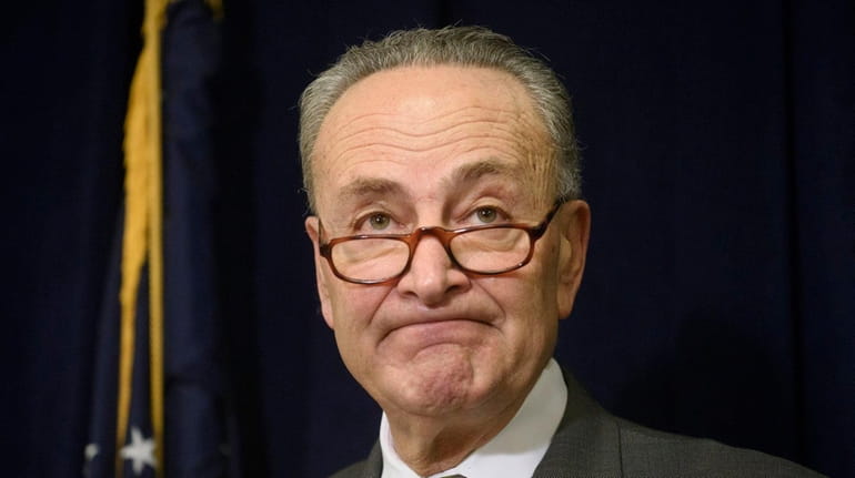 United States Senator Charles E. Schumer answers questions about a...