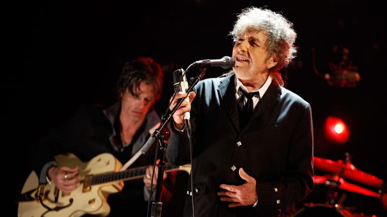 Bob Dylan, pictured, teams up with Willie Nelson, Robert Plant and...