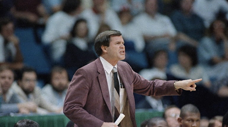 Louisville coach Denny Crum yells from the sideline during the...
