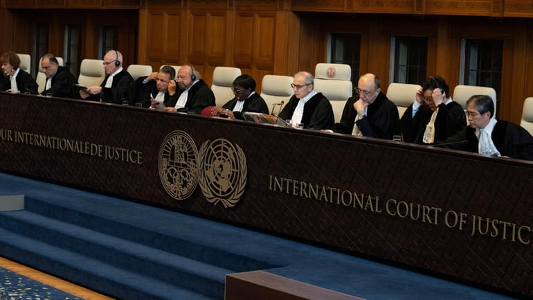 Judge Nawaf Salam, fourth from right, presides over the International...