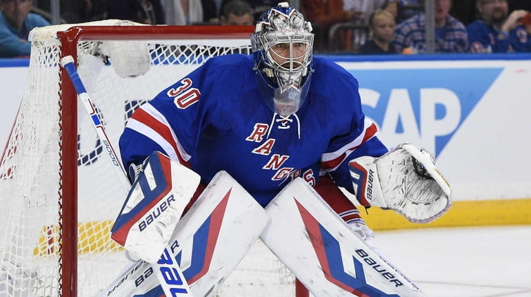 New York Rangers goalie (30) Henrik Lundqvist blocks a shot on
