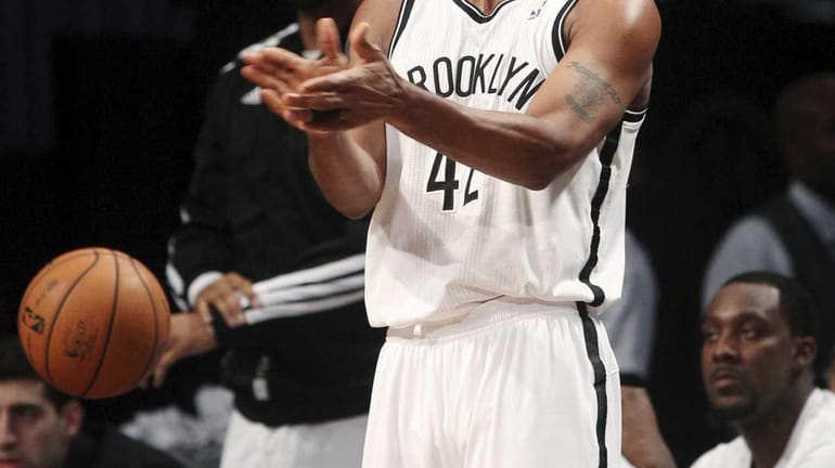 Brooklyn Nets' Jerry Stackhouse reacts after losing the ball out...