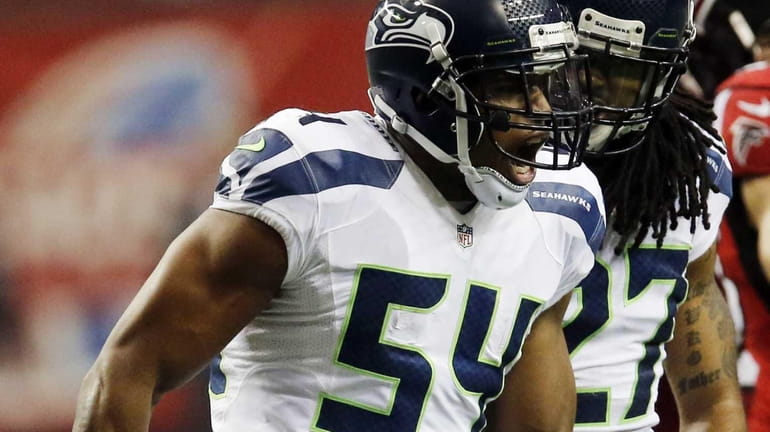 Seahawks middle linebacker Bobby Wagner reacts with Seattle Seahawks strong...