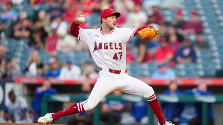 Los Angeles Angels starting pitcher Griffin Canning throws during the...