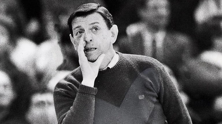 St. John's coach Lou Carnesecca cheers on his team in...