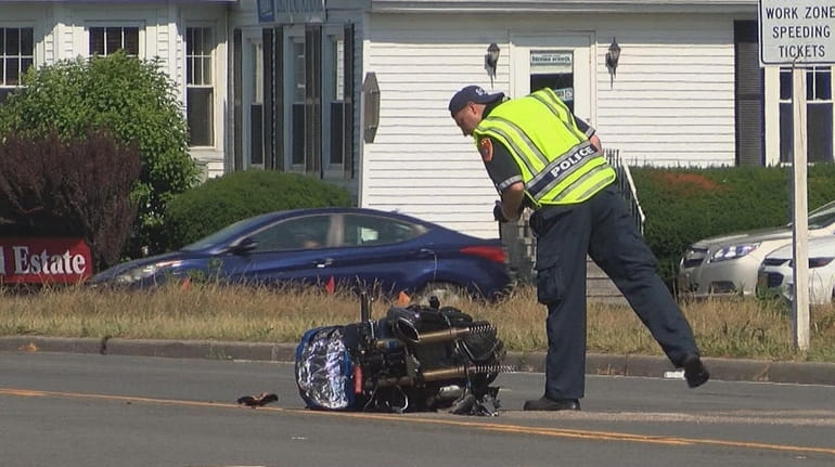 Suffolk Police and EMS respond to a crash involving a motorcycle...