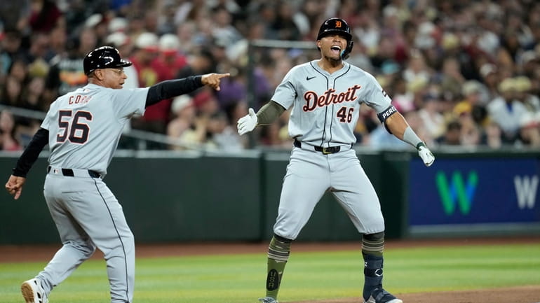 Detroit Tigers' Wenceel Pérez (46) celebrates his three-run triple against...