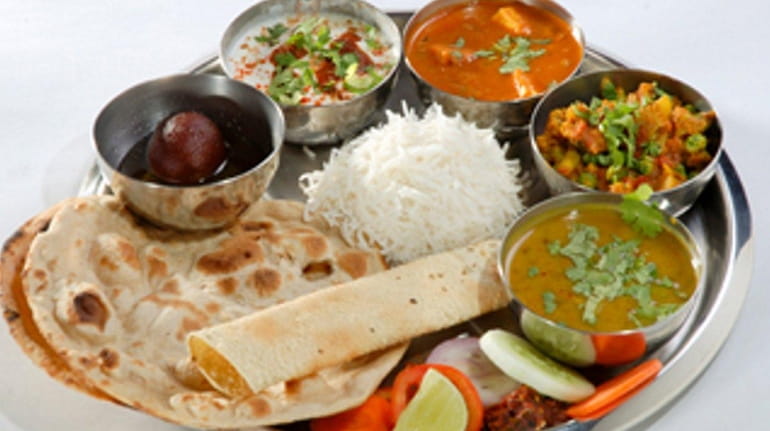 Dosa World in Hicksville serves four regional vegetarian thalis.
