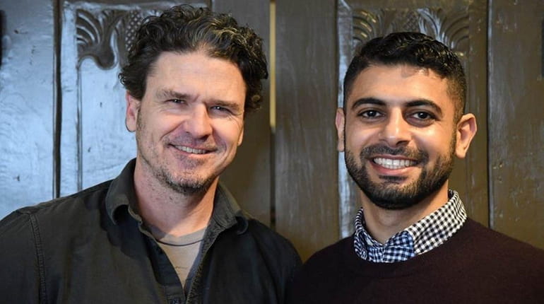 Writer Dave Eggers, left, and Mokhtar Alkanshali, who is the...