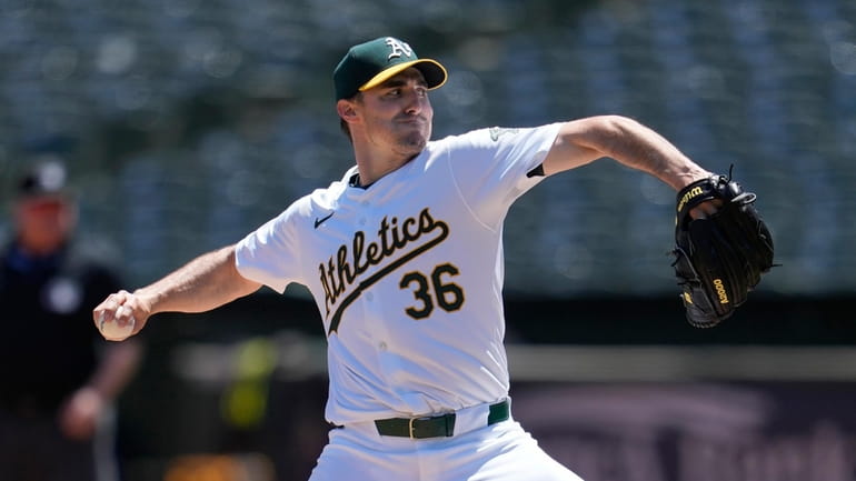 Oakland Athletics pitcher Ross Stripling works against the Pittsburgh Pirates...