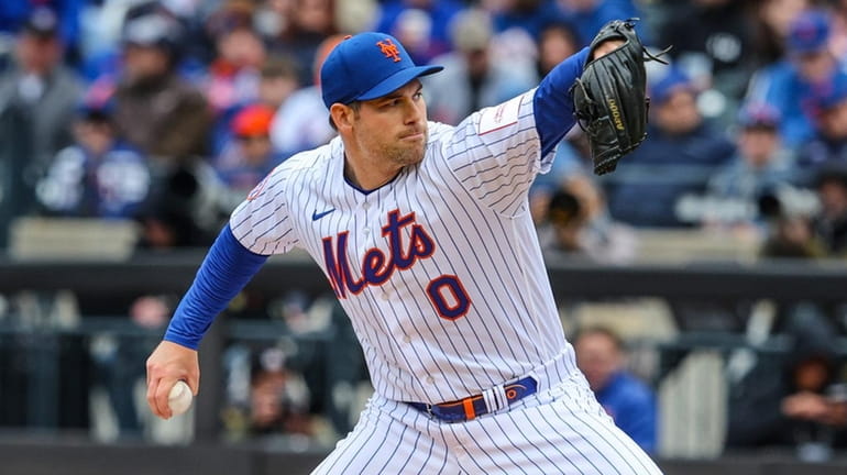 Adam Ottavino throws during the Mets' home opener against the...