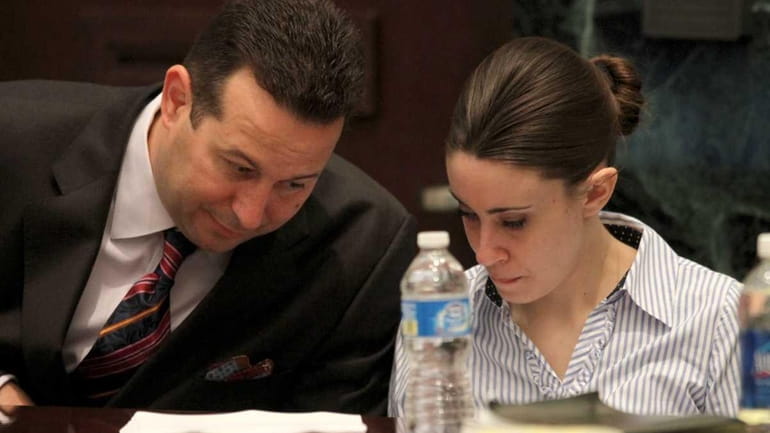 Defense attorney Jose Baez with his client Casey Anthony on...