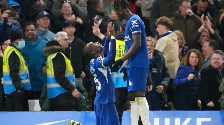 Chelsea's Nicolas Jackson, left, celebrates after scoring his side's second...