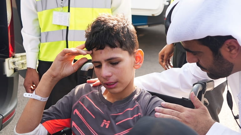 Twelve-year-old Amr Jandieh, who was wounded in the Israel-Hamas war,...