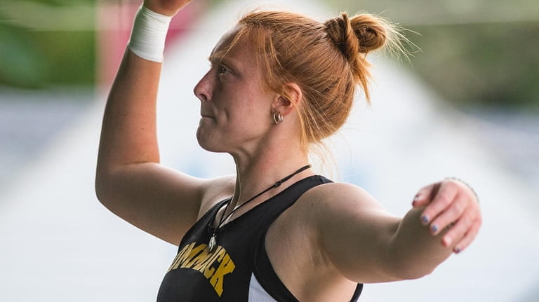 Commack's Julie Thomas competes in the girls shot put during...