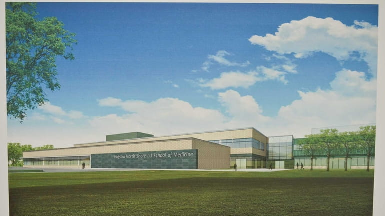 An artist's rendering of the new building is displayed during...