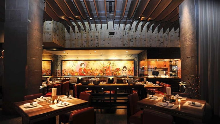 Tables are set in the dining room at Kibo Japanese...
