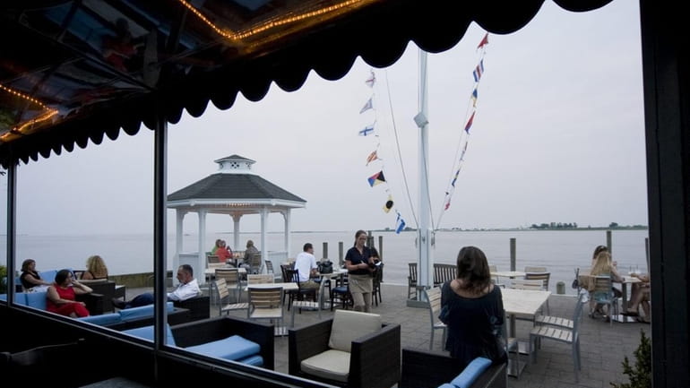 Diners on the outdoor patio of the View restaurant in...