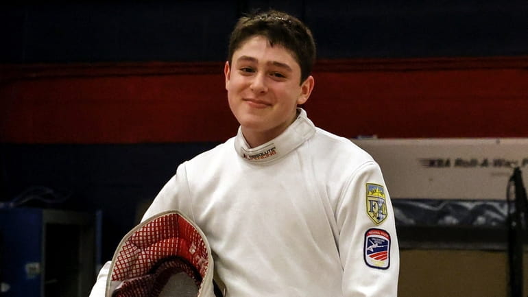 Luke Kugler of Oyster Bay wins the epee finals during...