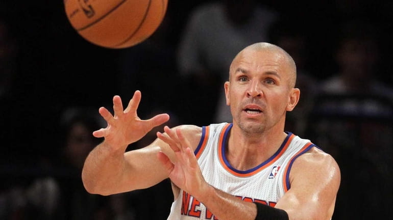 Jason Kidd passes the ball during a game against the...