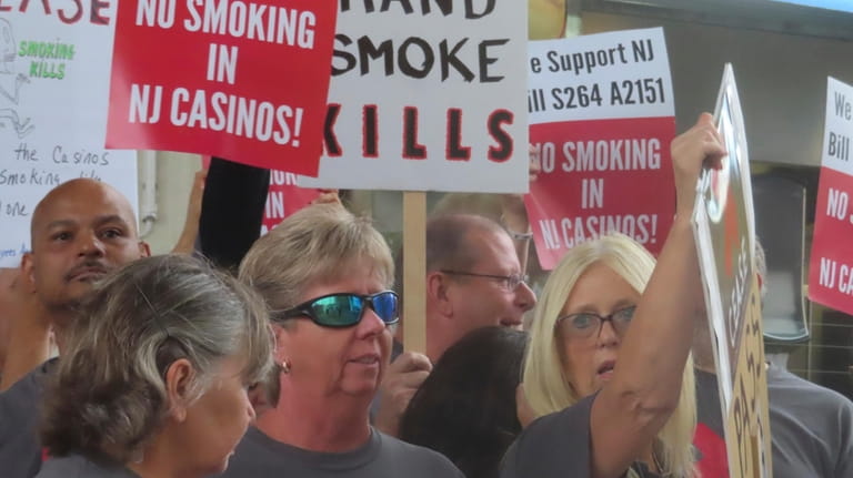 Casino workers and patrons opposed to smoking in the gambling...